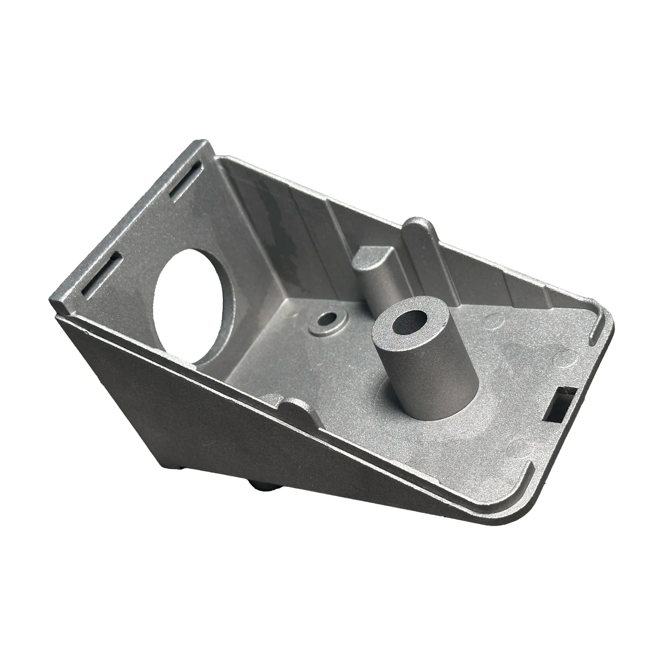 Cast mechanical component with mounting holes and raised bosses.