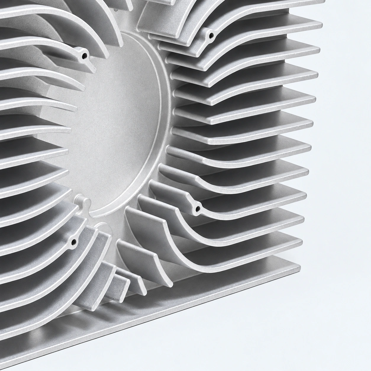 Close view of the cooling fins on an OBC housing.