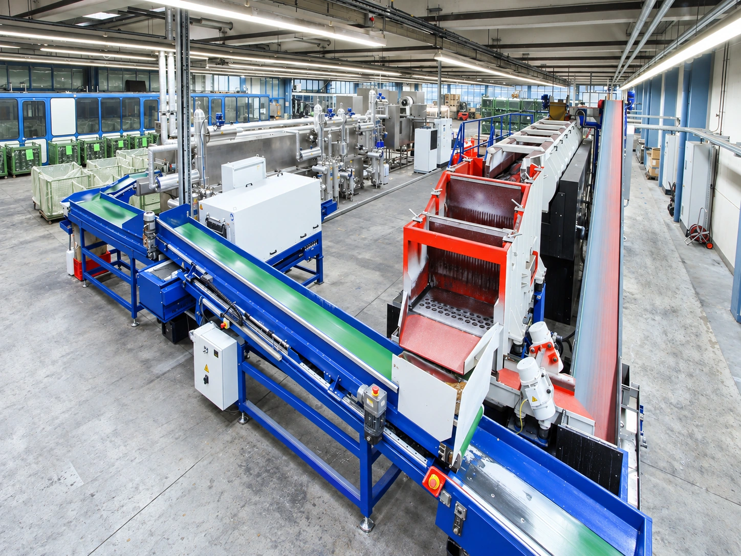 Illustrative surface cleaning and deburring line with conveyors and processing equipment.